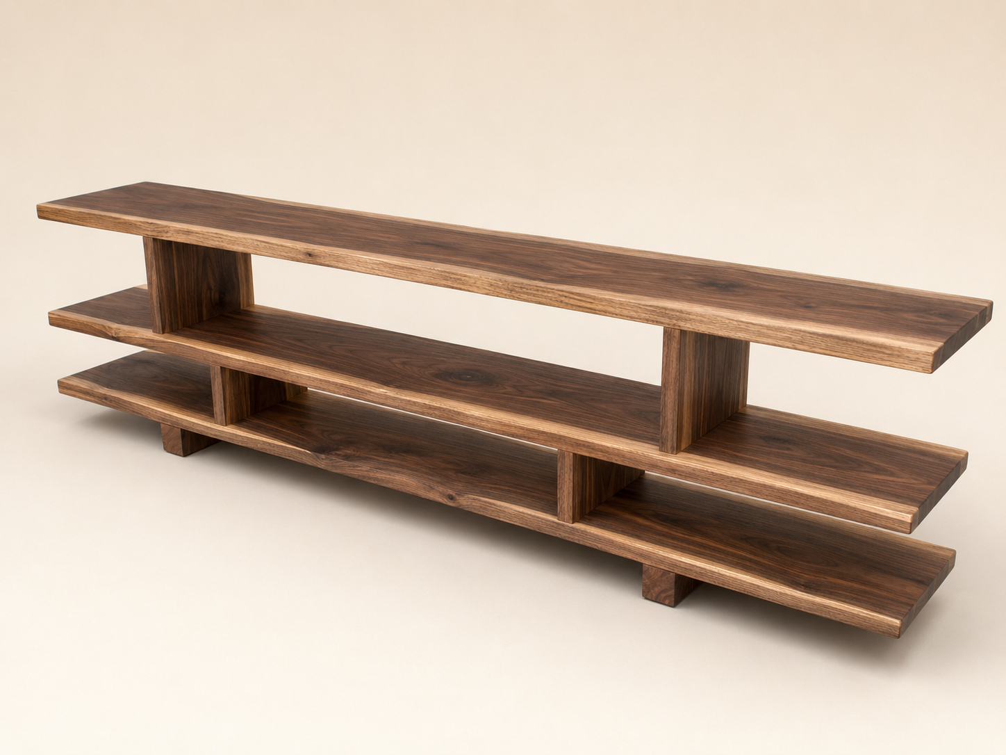 Walnut media unit showing rich dark grain